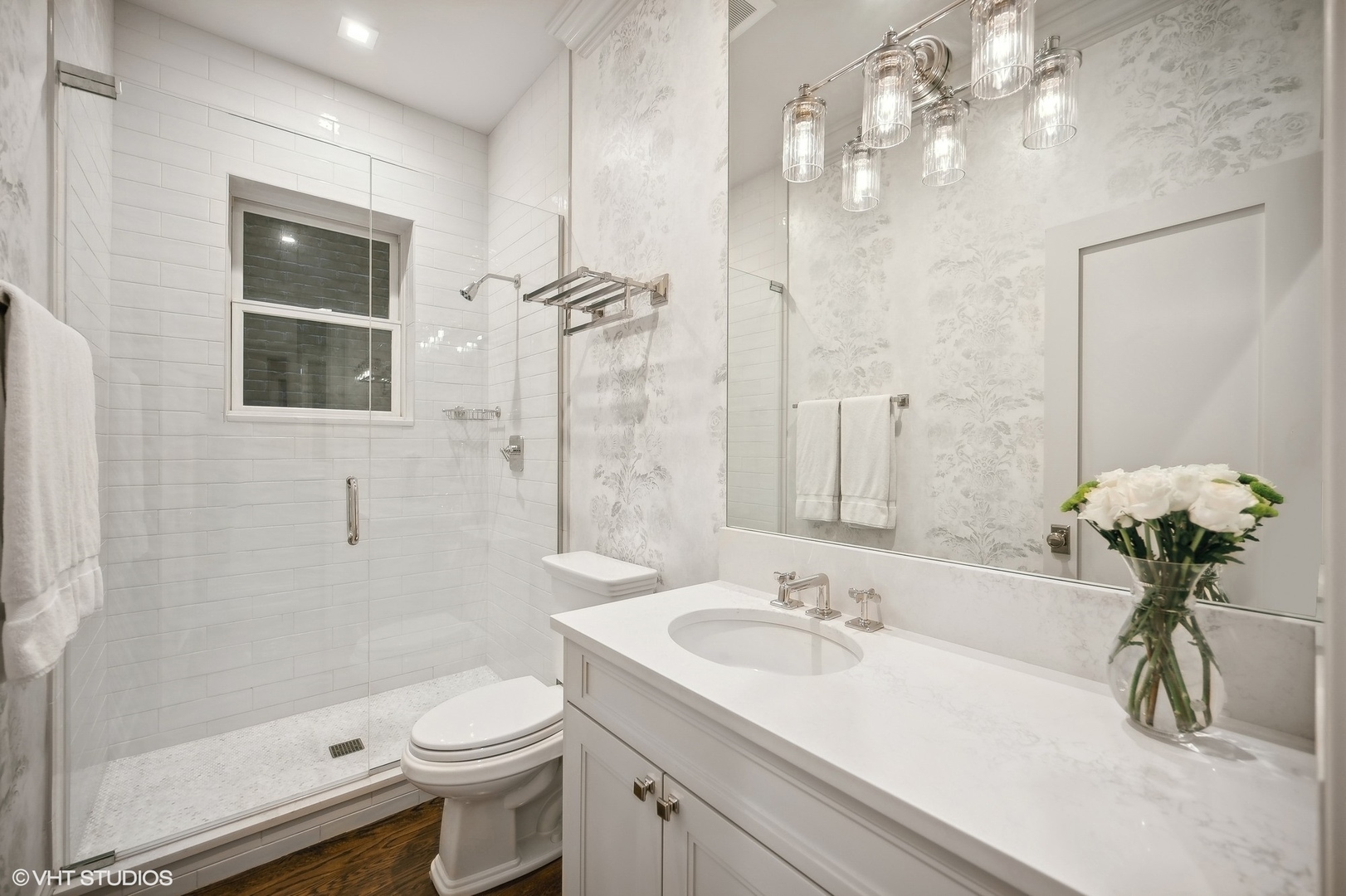 1855 North Dayton Street Chicago, IL 60614 - Photo 32 of 51 a bathroom with a sink a toilet and shower