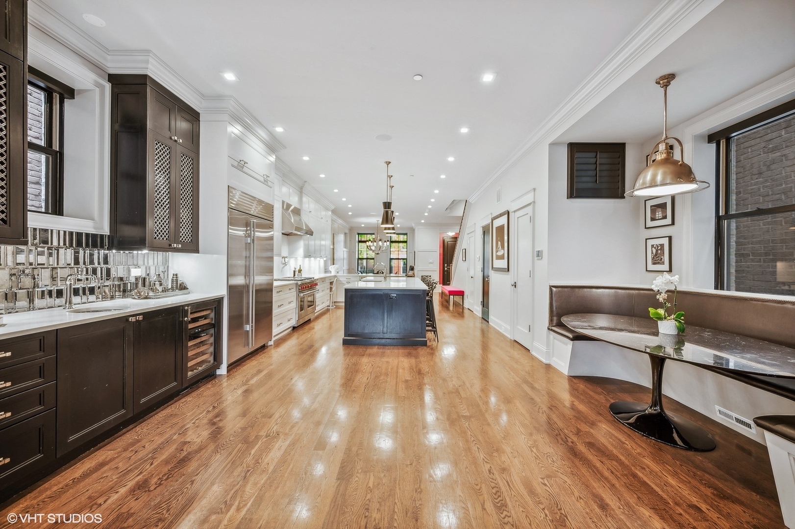 1855 North Dayton Street Chicago, IL 60614 - Photo 9 of 51 a large kitchen with stainless steel appliances granite countertop a large center island and a sink
