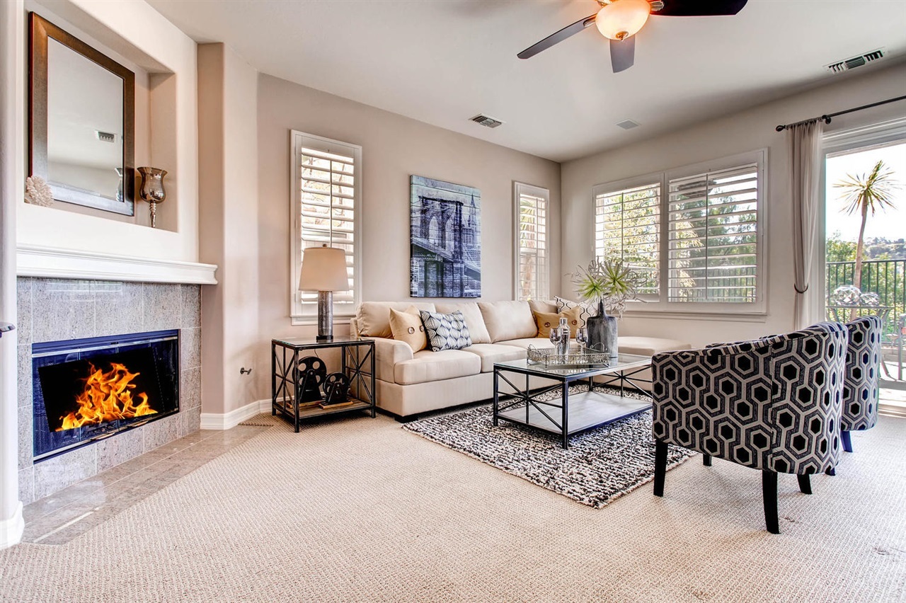 2817 Rancho Rio Chico Carlsbad, CA 92009 - Photo 3 of 24 With cozy fireplace