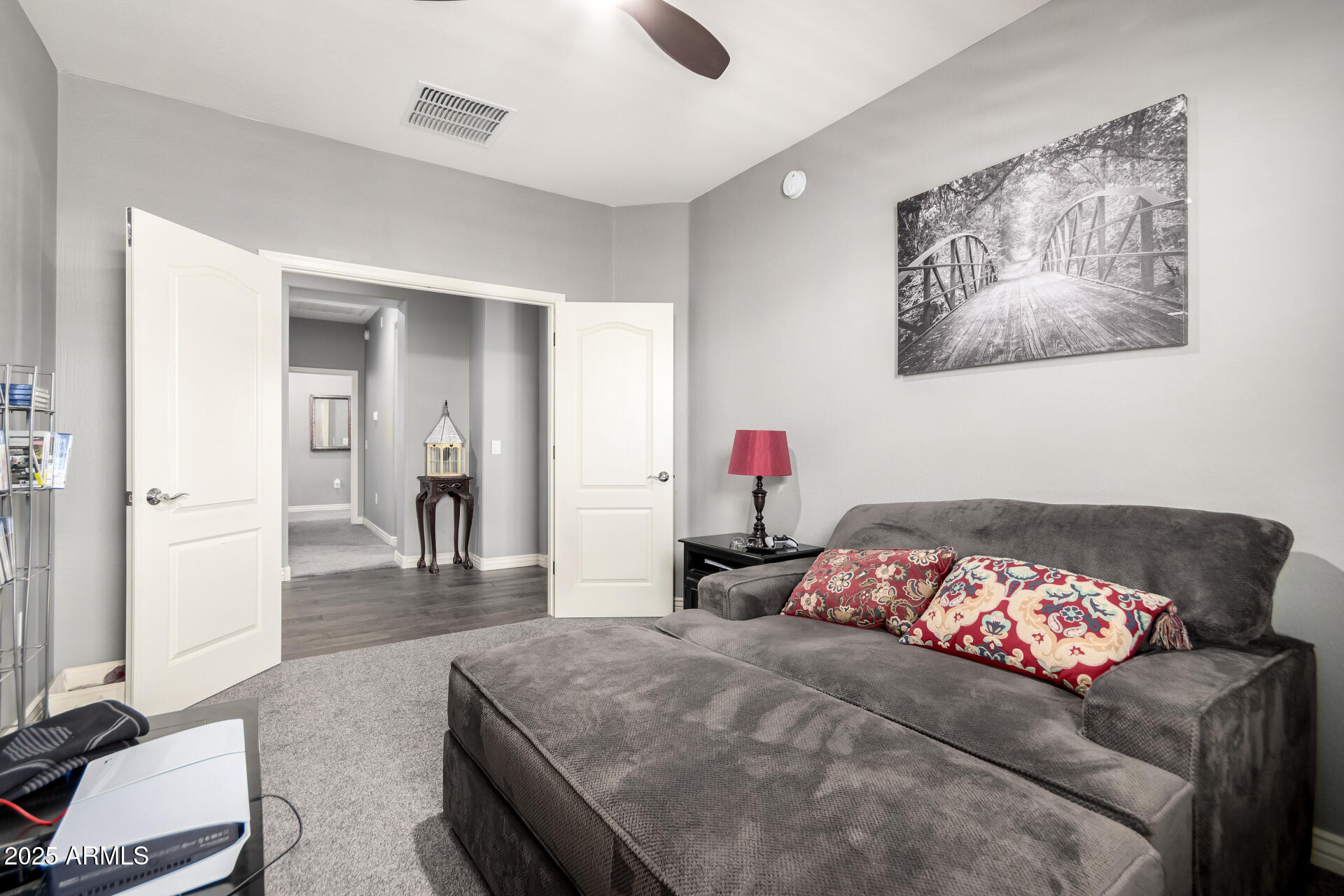 2425 West Bronco Butte Trail, Unit 2028 Phoenix, AZ 85085 - Photo 36 of 46 a bedroom with a bed and bathroom