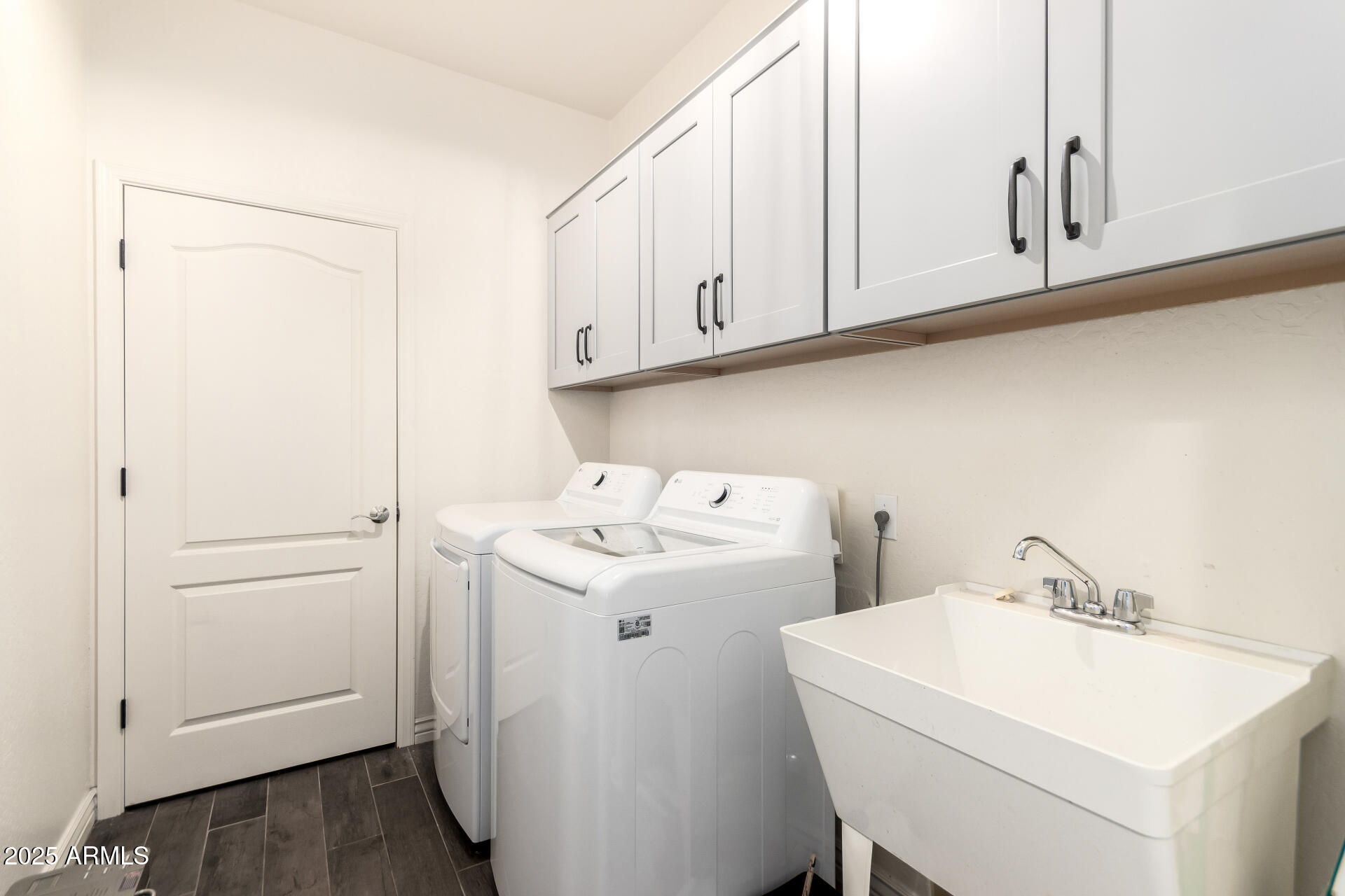 2425 West Bronco Butte Trail, Unit 2028 Phoenix, AZ 85085 - Photo 37 of 46 a utility room with dryer and washer