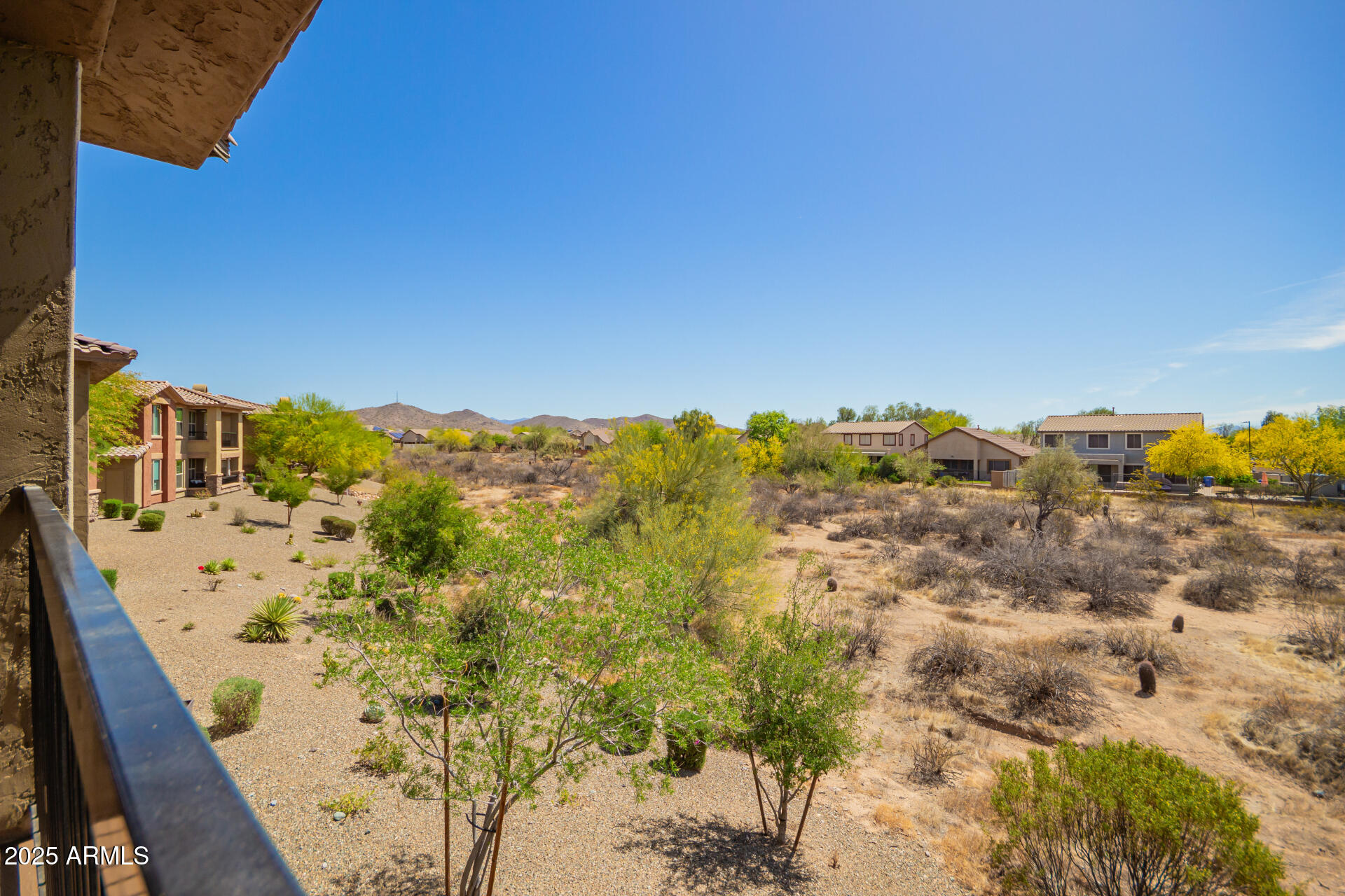 2425 West Bronco Butte Trail, Unit 2028 Phoenix, AZ 85085 - Photo 41 of 46 a view of a sky from a balcony