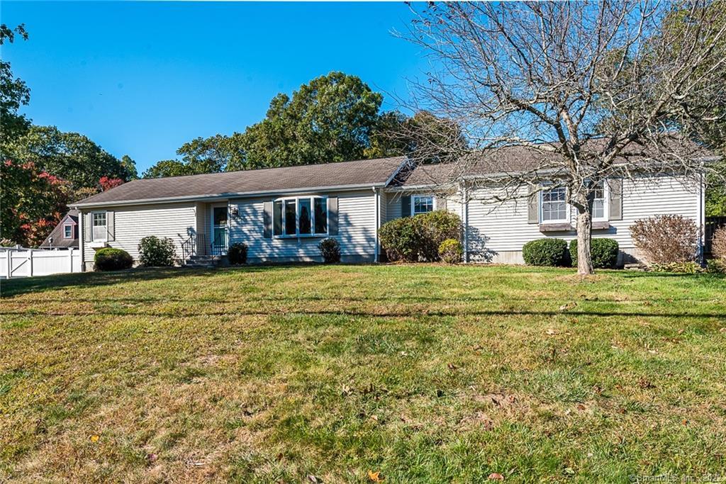 21 Attawan Road East Lyme, CT 06357 - Photo 1 of 1 a front view of house with yard and green space