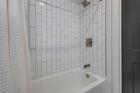 a bathroom with a bathtub