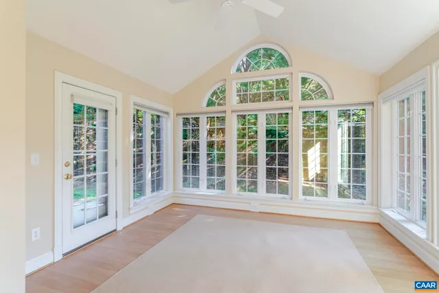 front view of a house with a large window