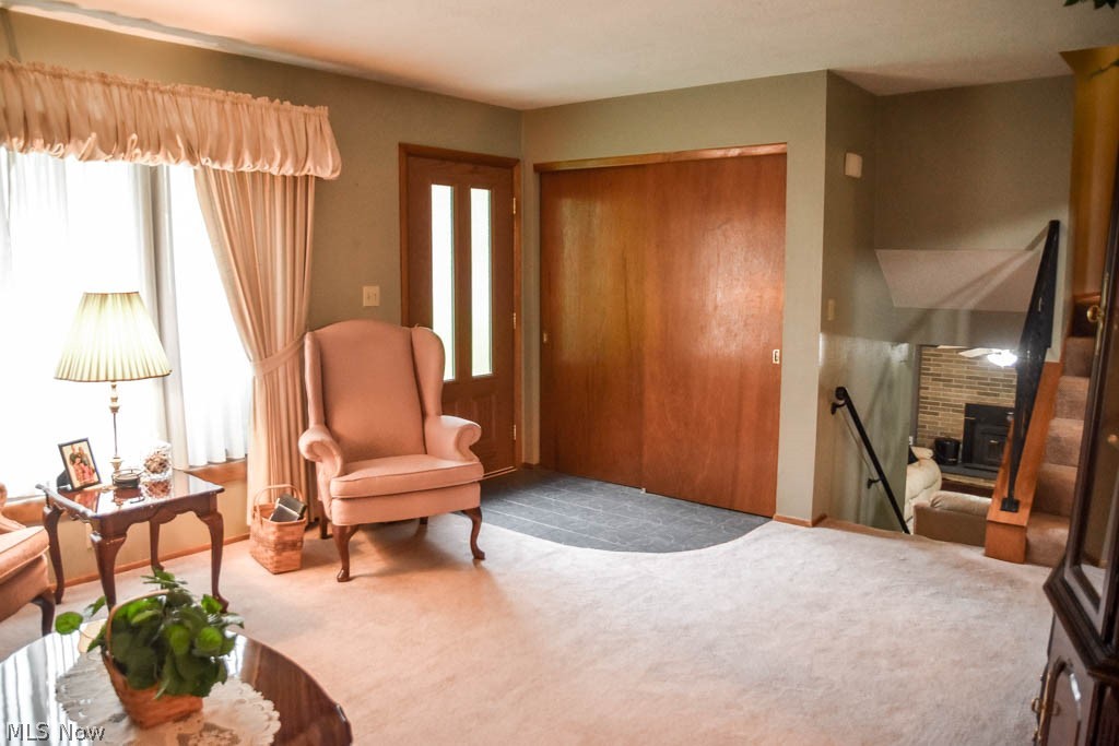 1265 Killian Road Akron, OH 44319 - Photo 9 of 32 The living room has a coat closet and new front door.