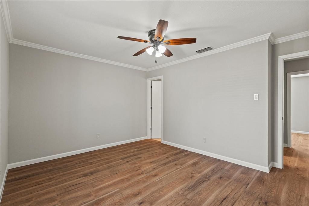900 Wandering Way Drive Allen, TX 75002 - Photo 21 of 35 wooden floor in an empty room
