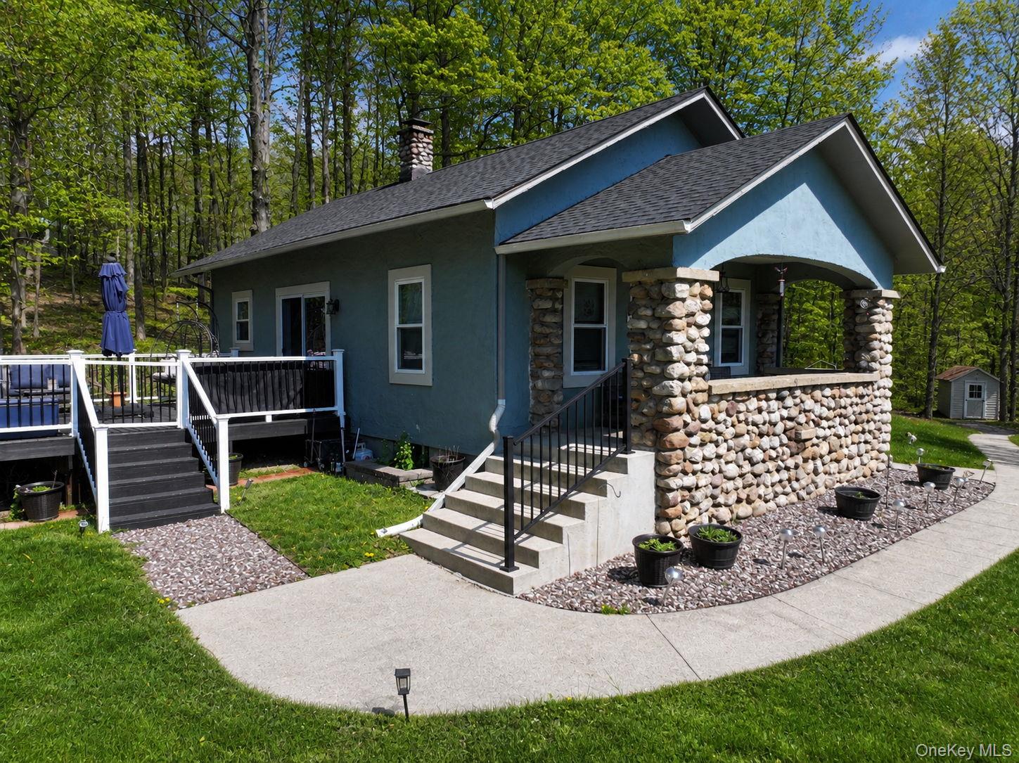 33 Horton Road Bloomingburg, NY 12721 - Photo 1 of 28 a front view of a house with garden