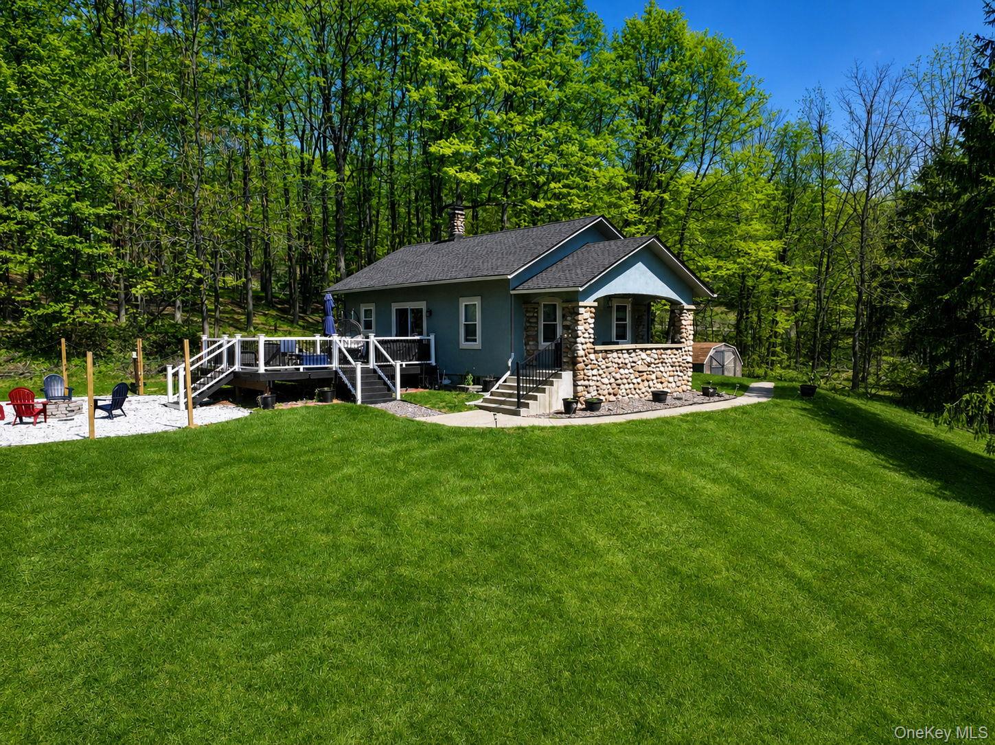 33 Horton Road Bloomingburg, NY 12721 - Photo 2 of 28 a front view of a house with garden