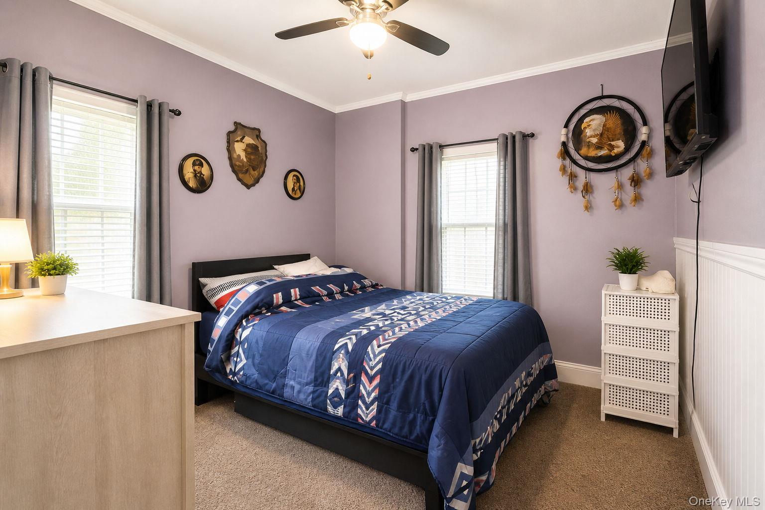 33 Horton Road Bloomingburg, NY 12721 - Photo 22 of 28 a bedroom with a bed and a chandelier