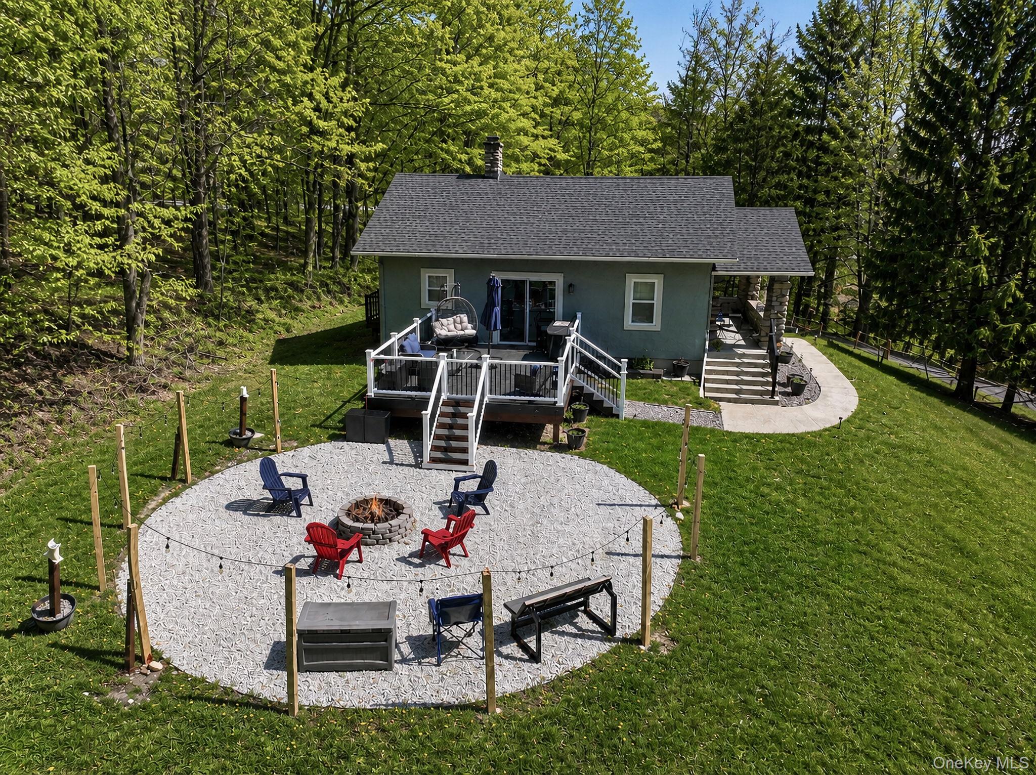 33 Horton Road Bloomingburg, NY 12721 - Photo 4 of 28 a view of house with backyard and outdoor seating