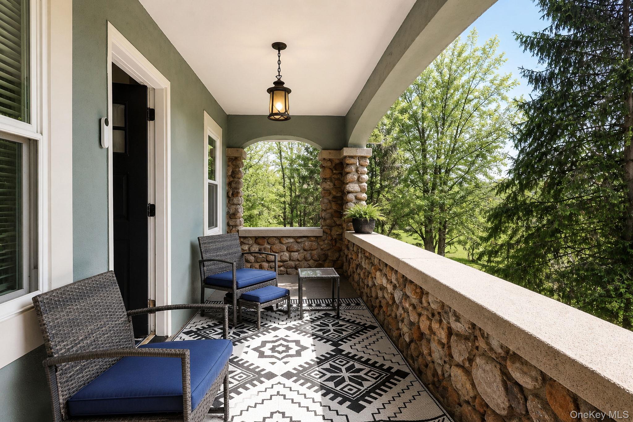 33 Horton Road Bloomingburg, NY 12721 - Photo 6 of 28 a balcony with chairs