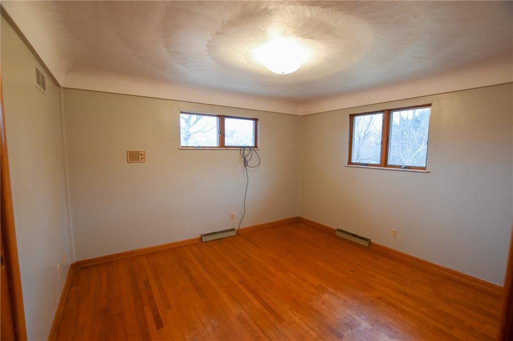 152 Oak Ridge Drive Butler, PA 16002 - Photo 8 of 12 an empty room with a window