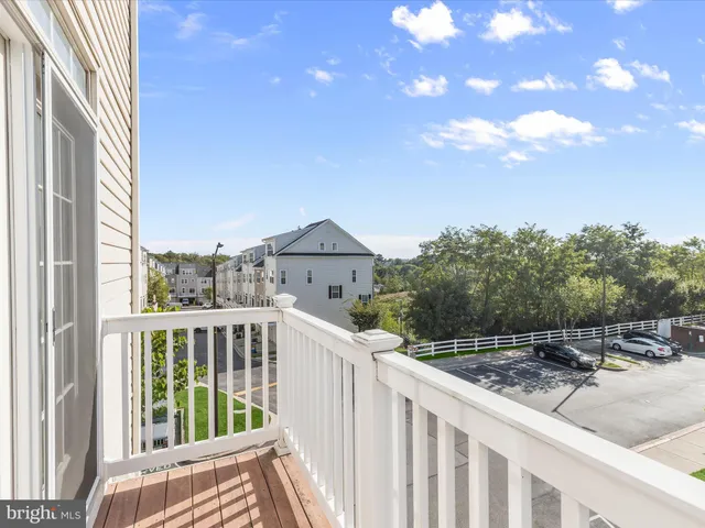 a kitchen with a stove a microwave and cabinets