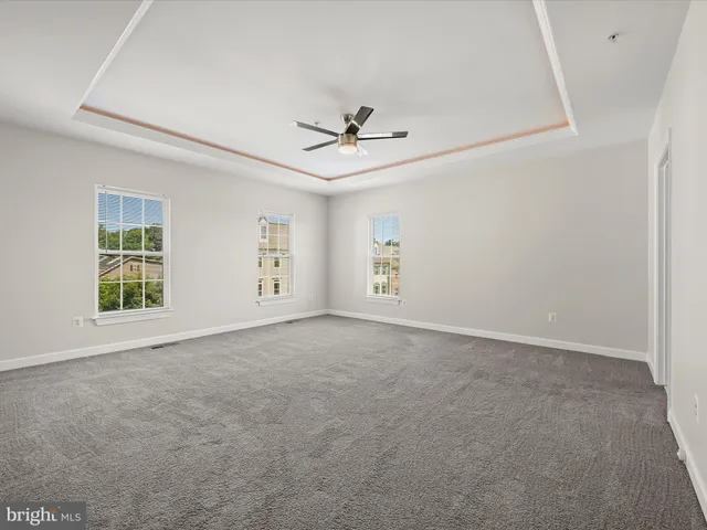 a view of a kitchen with a sink and a fireplace