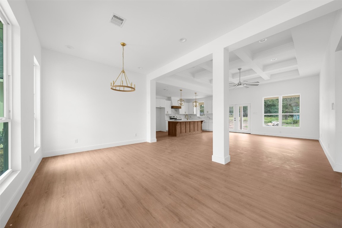 24651 Sligo Street Hempstead, TX 77445 - Photo 8 of 38 a view of empty room with wooden floor and windows
