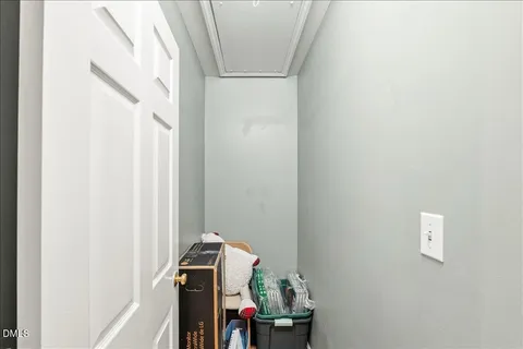 a view of storage and utility room with washer and dryer