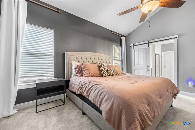 a bathroom with a sink vanity and a mirror