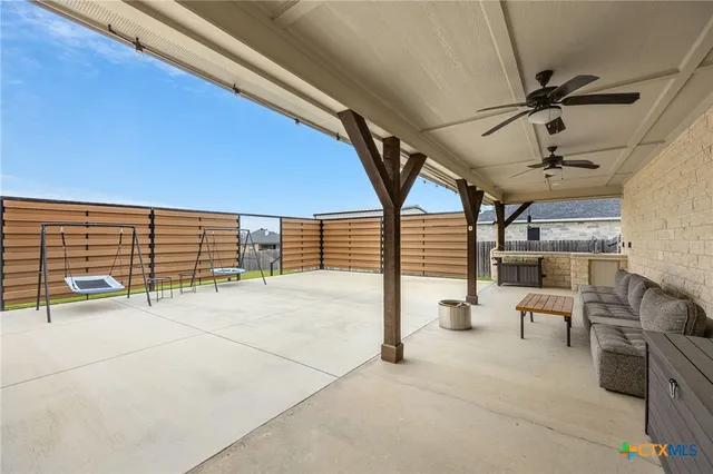 a kitchen with a stove and a cabinets