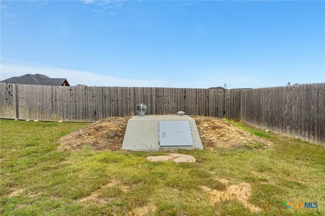 a view of a lake with a big yard