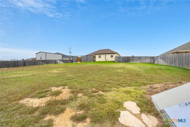 a view of swimming pool with seating area