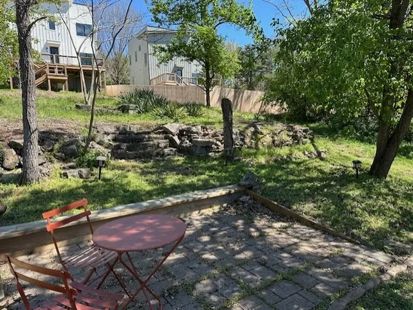a view of a backyard with plants