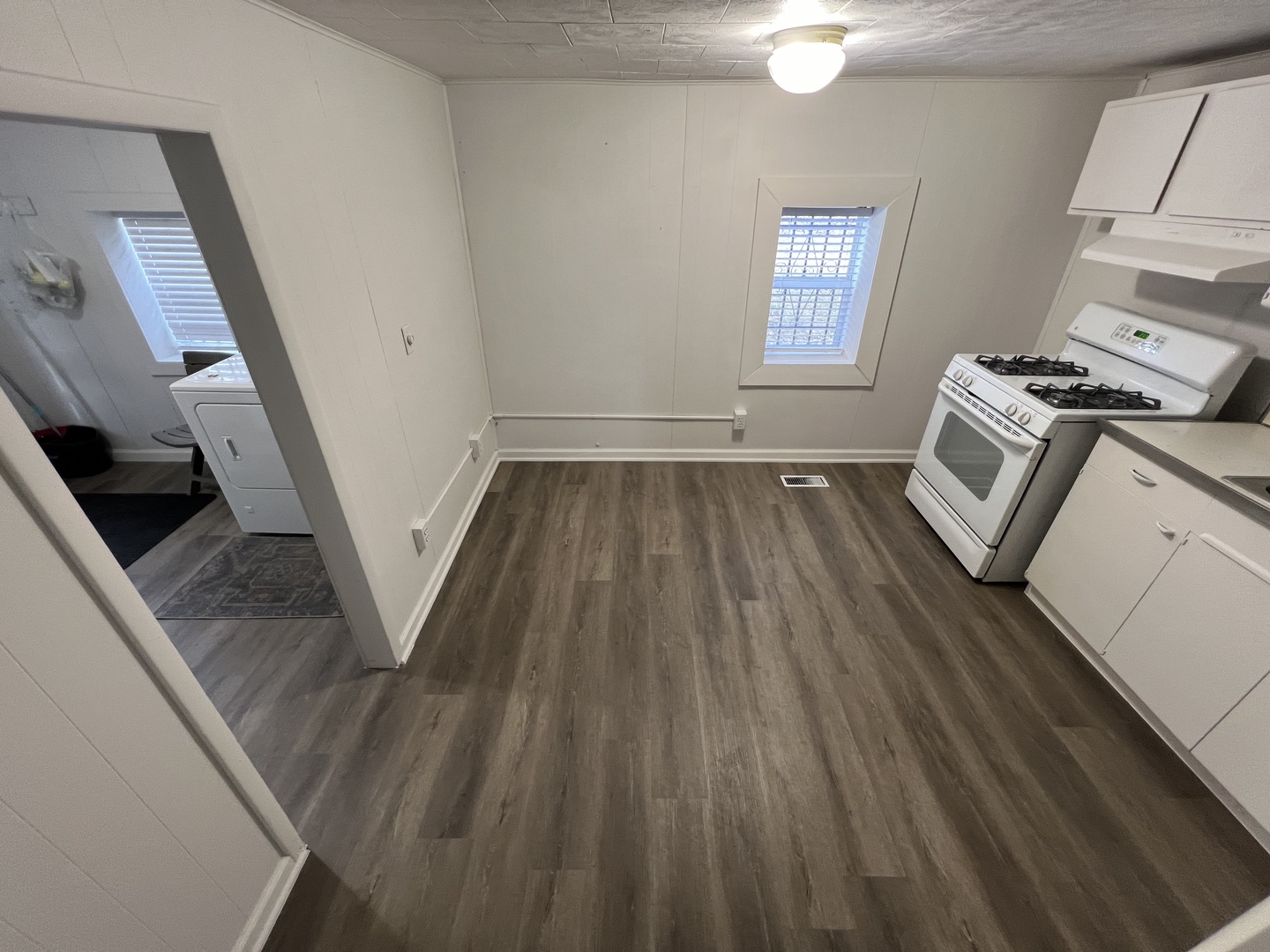 1641 Jericho Road Aurora, IL 60506 - Photo 13 of 15 a view of an empty room with wooden floor and a window