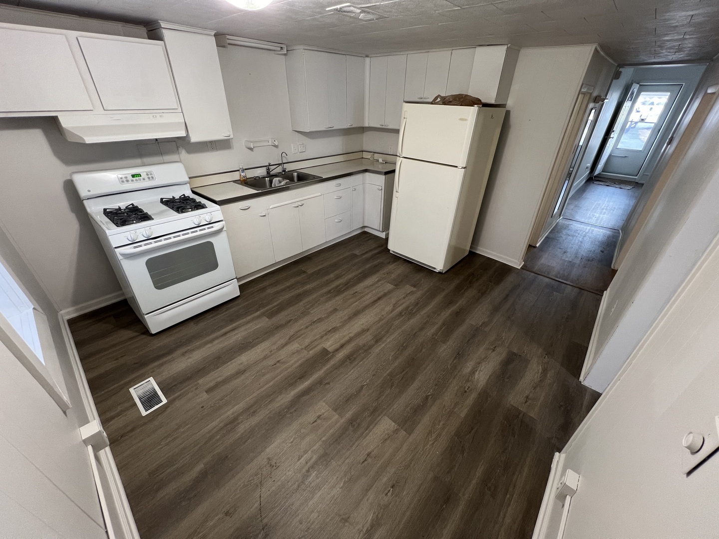 1641 Jericho Road Aurora, IL 60506 - Photo 14 of 15 a kitchen with a white cabinets and white appliances