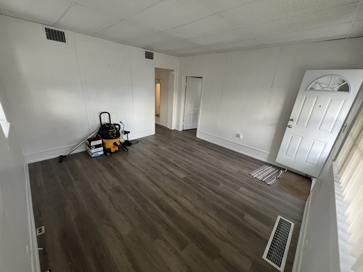 1641 Jericho Road Aurora, IL 60506 - Photo 6 of 15 a view of a room with wooden floor and furniture
