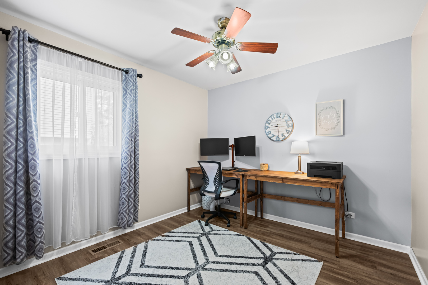 585 Amherst Lane Hoffman Estates, IL 60169 - Photo 15 of 25 a view of a workspace with furniture and a window