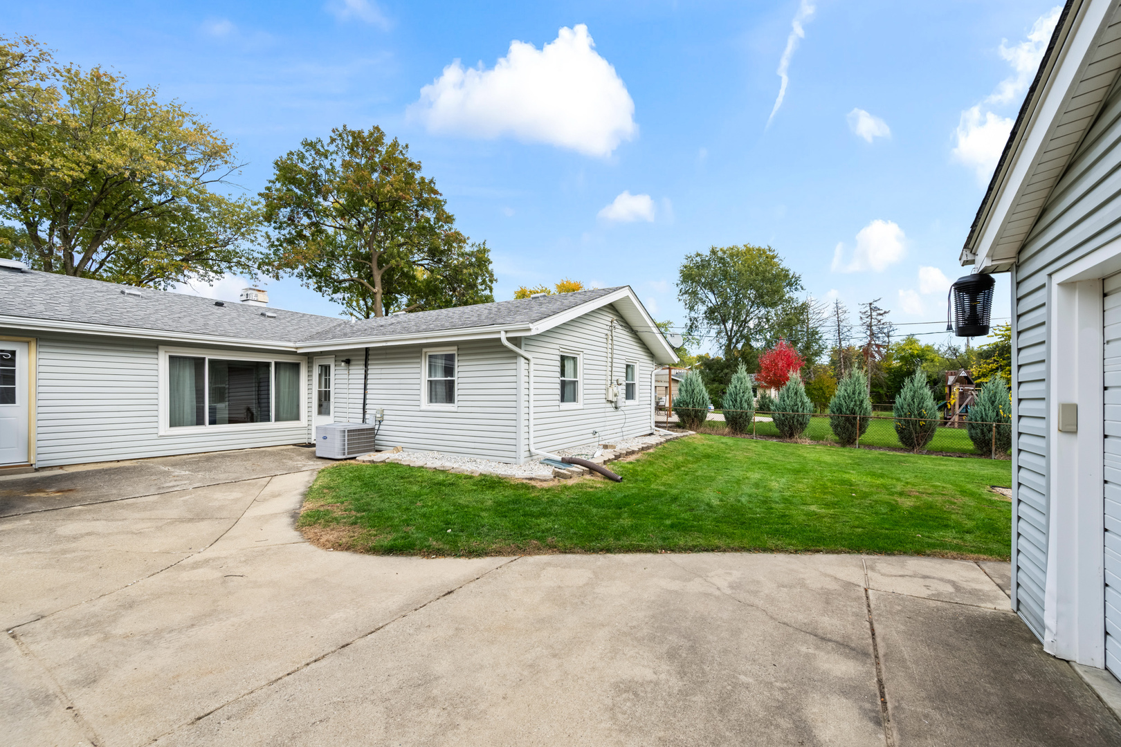 585 Amherst Lane Hoffman Estates, IL 60169 - Photo 24 of 25 a view of a house with a backyard