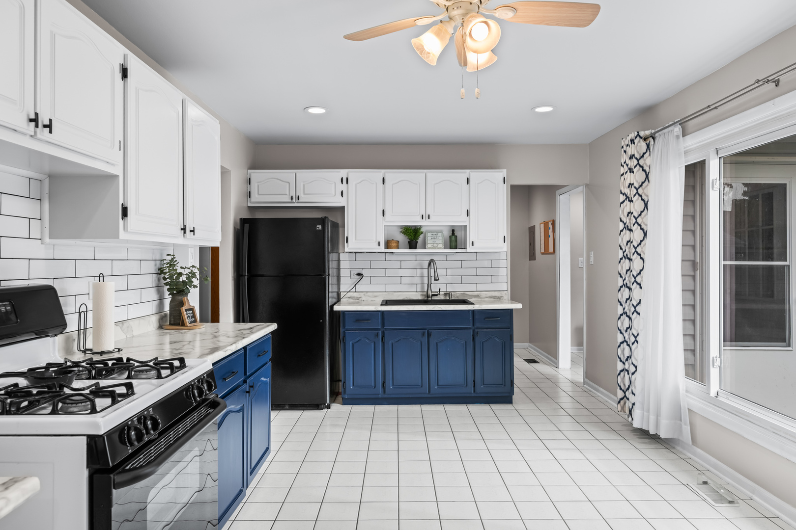 585 Amherst Lane Hoffman Estates, IL 60169 - Photo 10 of 25 a kitchen with stainless steel appliances granite countertop a stove a refrigerator and a stove
