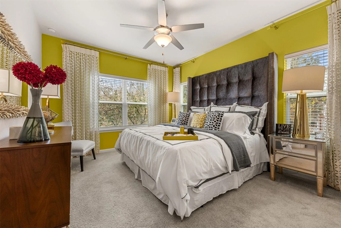 12700 Ridgeline Boulevard, Unit 6308 Cedar Park, TX 78613 - Photo 3 of 16 a bedroom with a bed dresser and a window