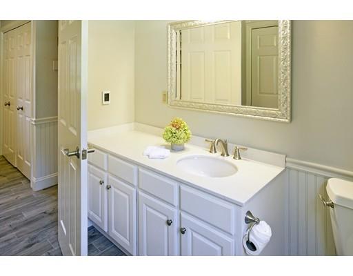 92 Forest Street Duxbury, MA 02332 - Photo 14 of 34 a bathroom with a sink and a mirror
