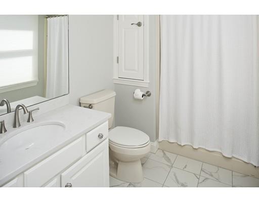 92 Forest Street Duxbury, MA 02332 - Photo 21 of 34 a bathroom with a sink toilet and window