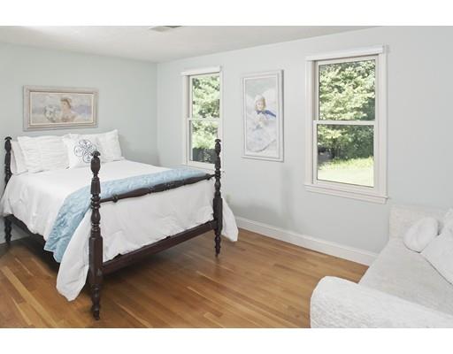 92 Forest Street Duxbury, MA 02332 - Photo 22 of 34 a bedroom with a bed and a window