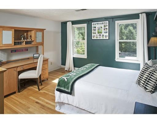 92 Forest Street Duxbury, MA 02332 - Photo 23 of 34 a bedroom with a bed a painting and a window