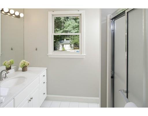 92 Forest Street Duxbury, MA 02332 - Photo 24 of 34 a bathroom with a sink vanity granite and a bathtub