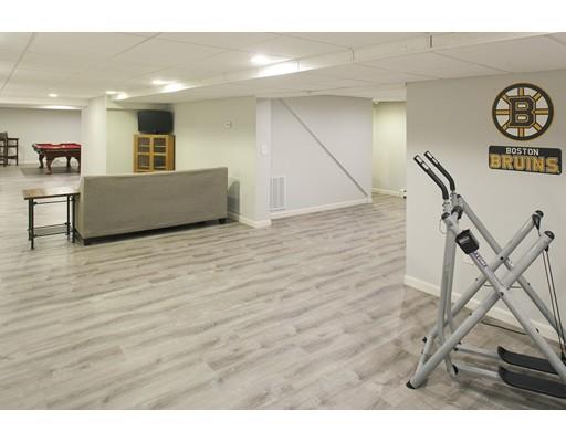 92 Forest Street Duxbury, MA 02332 - Photo 27 of 34 a view of a livingroom with furniture and a ceiling fan