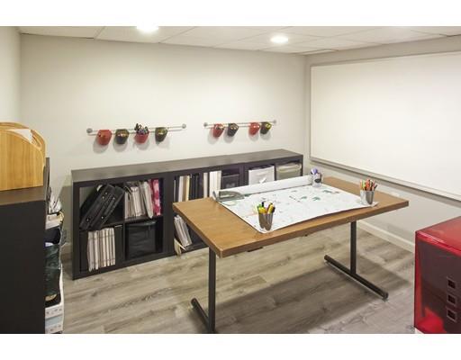 92 Forest Street Duxbury, MA 02332 - Photo 29 of 34 a living room with furniture and a wooden floor