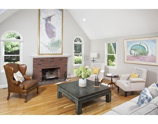 92 Forest Street Duxbury, MA 02332 - Photo 10 of 34 a living room with furniture a window and a fireplace