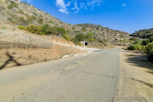a view of a yard with mountain view