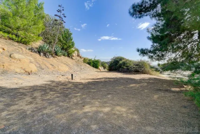 a view of a lake with mountains in the background