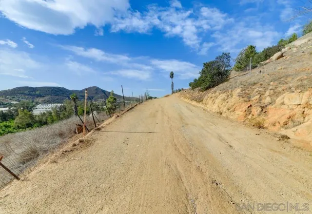 a view of backyard with mountain