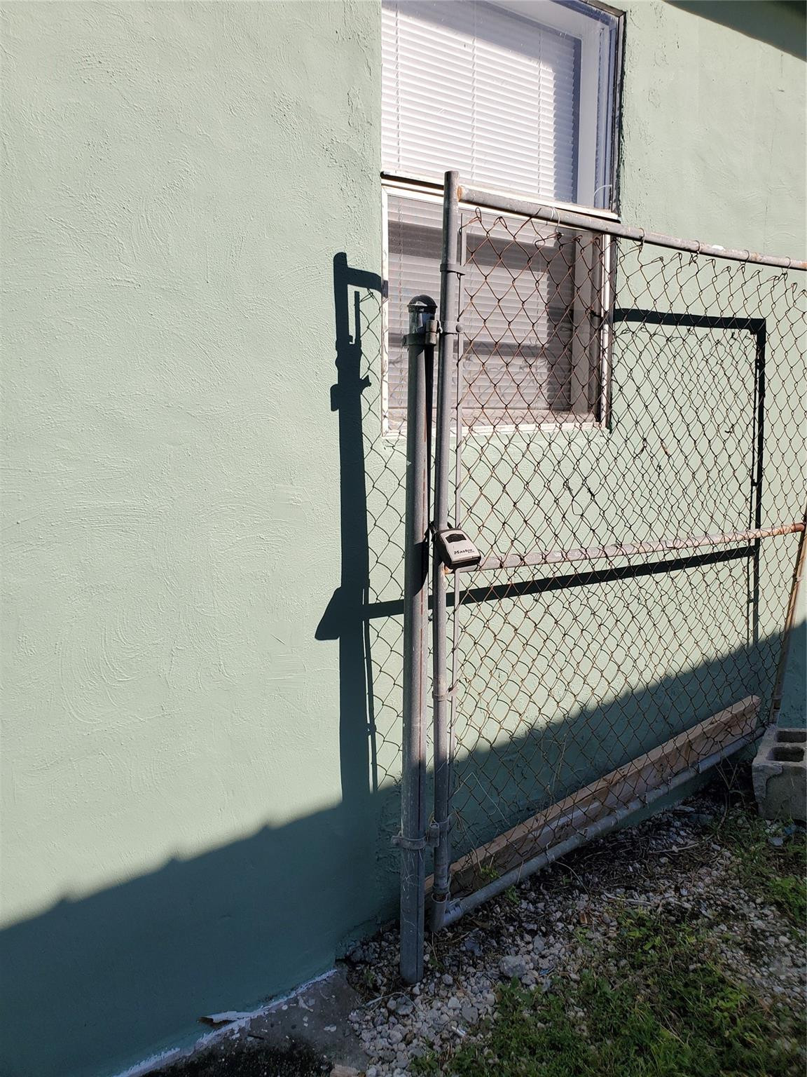 258 Adams Place, Unit 2 Pahokee, FL 33476 - Photo 25 of 25 Fence Gate