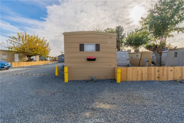 a view of balcony with wooden floor