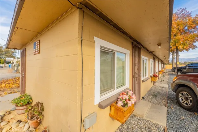 an aerial view of houses with outdoor space