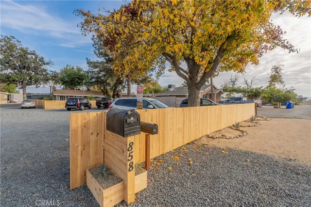 a view of a city with lawn chairs
