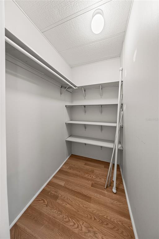 712 Devon Drive Lady Lake, FL 32159 - Photo 21 of 31 a view of a room with rack on the wall