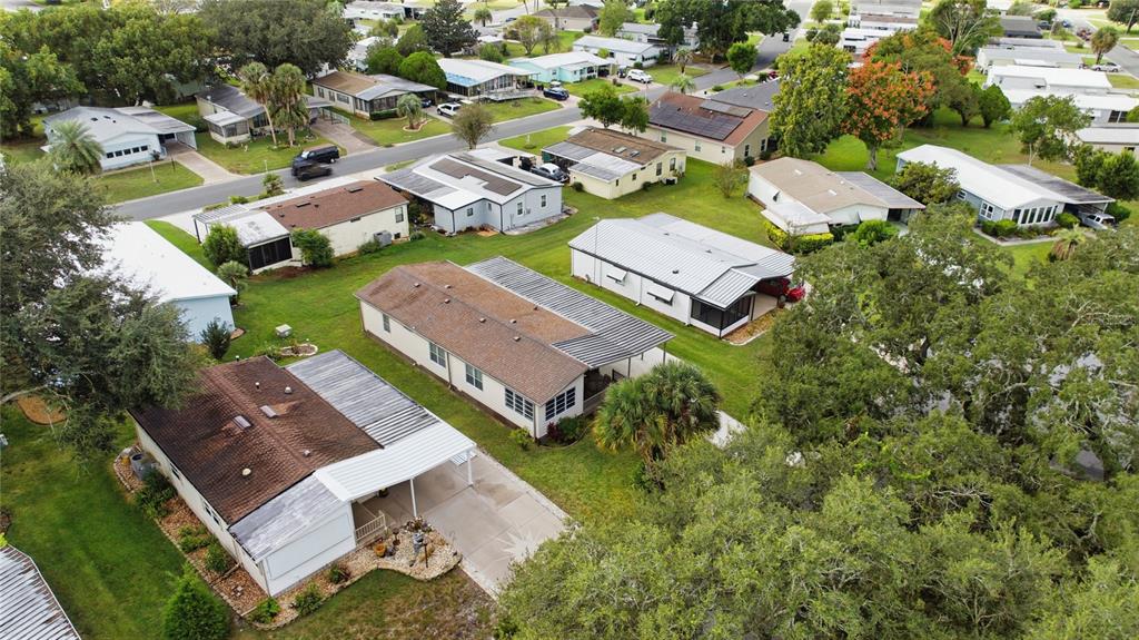 712 Devon Drive Lady Lake, FL 32159 - Photo 29 of 31 an aerial view of residential house with outdoor space and street view